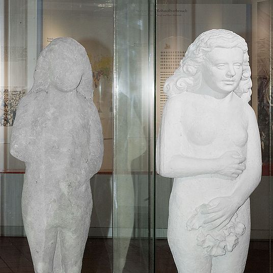 Statues of Eve, 16th century and 20th century Statues of Eve, sandstone statue from the 16th century and plaster model from the 20th century. The sandstone statue is a late Gothic representation of Eve and has been corroded by acid rain. The plaster model next to it shows how the statue looked originally, before it was corroded.