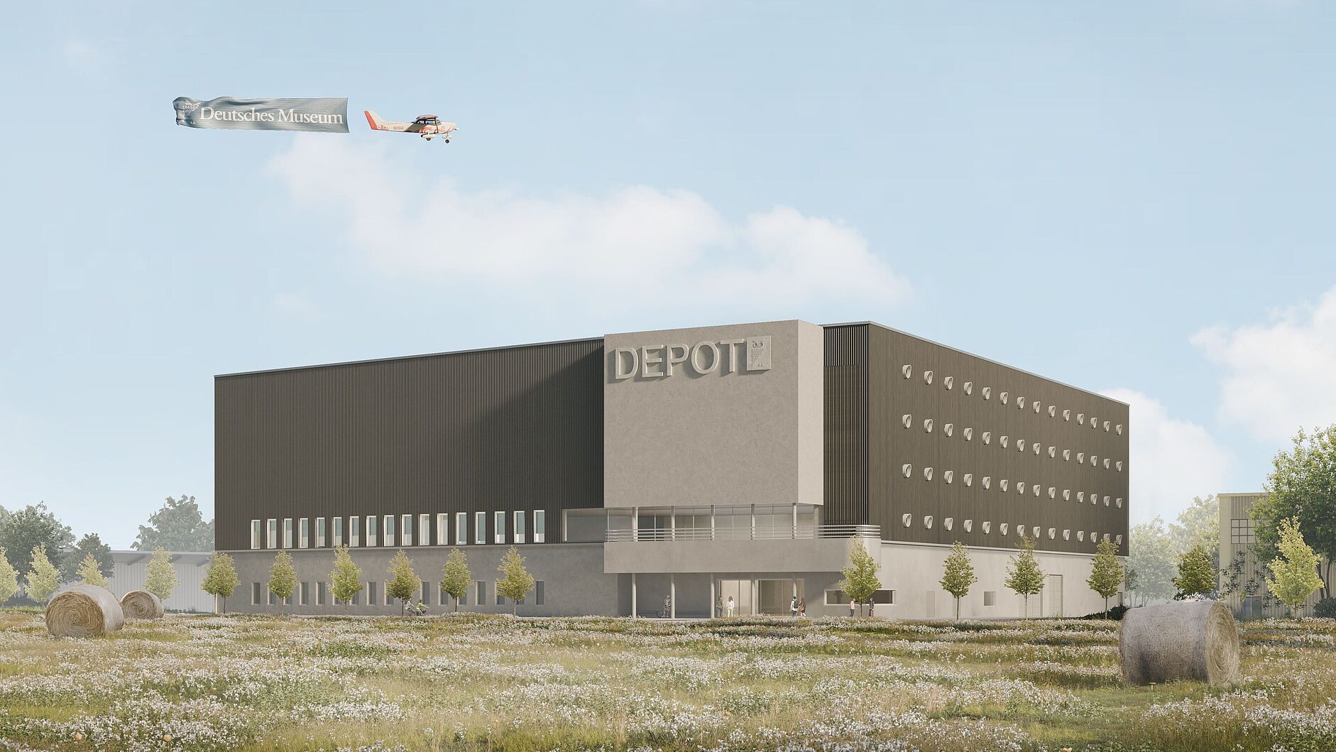 Modernes, blockartiges Depot-Gebäude mit der Aufschrift "DEPOT" auf der Fassade, davor eine blühende Wiese mit Heuballen und jungen Bäumen, im blauen Himmel ein Kleinflugzeug mit Werbebanner "Deutsches Museum".